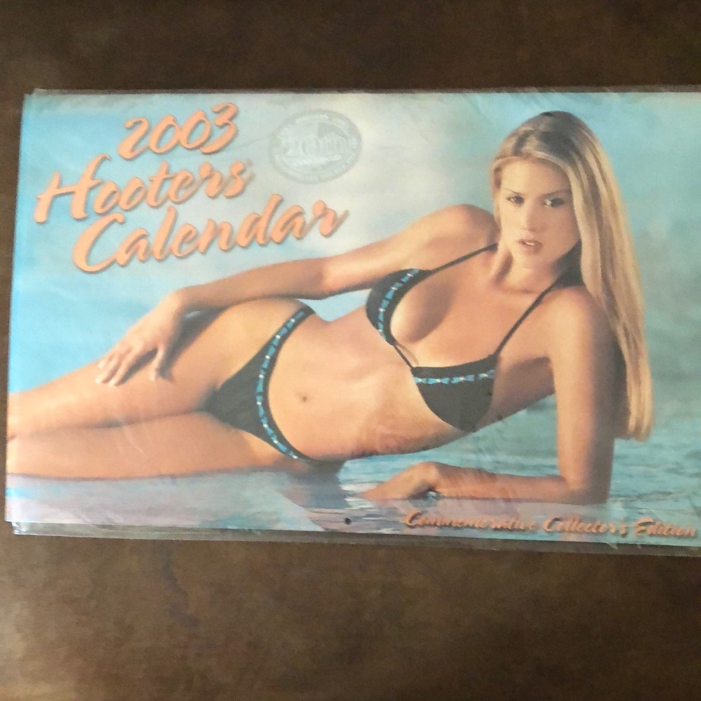 2003 20th anniversary edition Hooters wall calendar. New in wrapper.